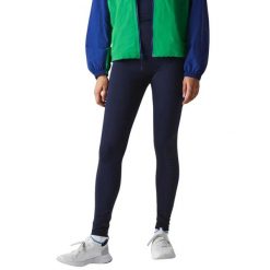 Legginsy treningowe damskie Lacoste. Niebieskie legginsy damskie Lacoste, uniwersalny, bez wzorów, z materiału, długie, na fitness i siłownię. Za 317.00 zł.