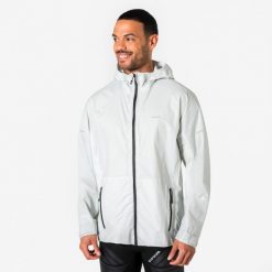 Kurtka do biegania przeciwdeszczowa męska Kiprun Run 900 Rain. Szare kurtki sportowe męskie KIPRUN, na zimę, l, bez wzorów, z materiału, bez kaptura, do biegania. Za 399.99 zł.