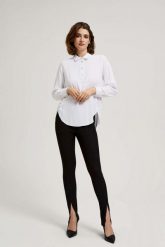 Legginsy z rozcięciem z przodu nogawek. Legginsy damskie MOODO, bez wzorów, z elastanu. W wyprzedaży za 35.99 zł.
