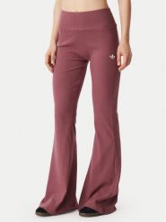 Adidas Legginsy Essentials KT4760 Różowy ciemny Flared Leg. Czerwone legginsy damskie Adidas, bez wzorów, z wiskozy. Za 219.99 zł.