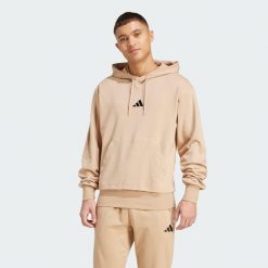 Bluza z kapturem Essentials Feelcozy French Terry. Czarne bluzy męskie Adidas, m, bez wzorów, z materiału, z kapturem, na fitness i siłownię. Za 219.00 zł.