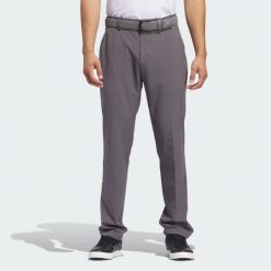 Spodnie Ultimate365 Tapered Golf. Szare swetry męskie Adidas, l, bez wzorów, z elastanu, klasyczne, bez kołnierzyka, bez ramiączek. Za 323.70 zł.