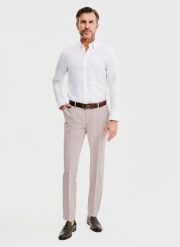 PAKO LORENTE – Spodnie garniturowe w kolorze różowym. Czerwone eleganckie spodnie męskie Pako Lorente, m, bez wzorów, z poliesteru, biznesowe. Za 489.99 zł.