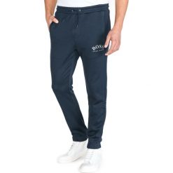 BOSS Hugo Boss Spodnie dresowe Niebieski. Niebieskie spodnie sportowe męskie BOSS Hugo Boss, m, bez wzorów, z bawełny. Za 576.95 zł.