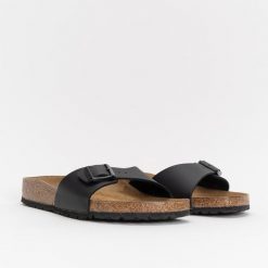Birkenstock Madrid BS Klapki damskie. Czarne klapki damskie Birkenstock, bez wzorów, młodzieżowe, bez obcasa, bez zapięcia. Za 319.99 zł.