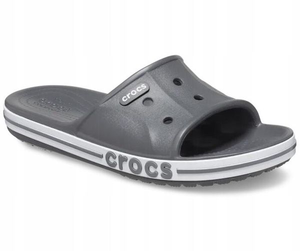 Klapki Dla Dorosłych Crocs Bayaband Slide. Białe klapki damskie Crocs, bez wzorów, z materiału, bez zapięcia. Za 129.99 zł.