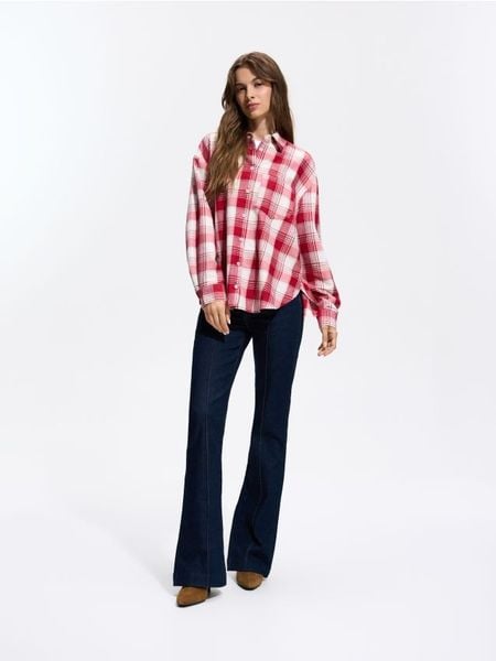 Jeansy flare - granatowy. Niebieskie jeansy damskie Reserved, bez wzorów, z bawełny. Za 159.99 zł.
