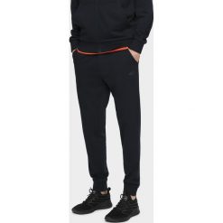 Spodnie dresowe męskie SPMD300 - granat. Spodnie sportowe męskie 4F, m, bez wzorów, z dresówki. Za 119.99 zł.