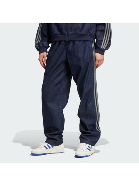 Adidas Jeansy adicolor Denim Stone JX6459 Niebieski Regular Fit. Niebieskie jeansy męskie Adidas, z bawełny. Za 349.99 zł.