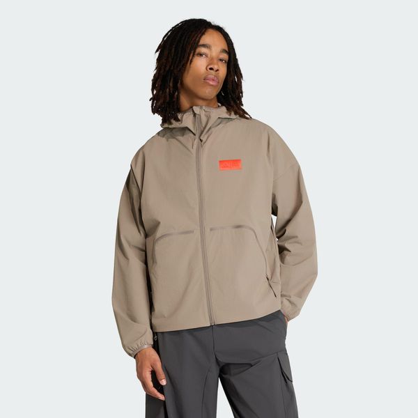KURTKA AUDI REVOLUT F1 TEAM ELEVATED WOVEN. Brązowe kurtki męskie Adidas, l, bez wzorów, z elastanu, eleganckie, bez kaptura. Za 649.00 zł.