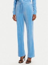 Juicy Couture Spodnie dresowe Tina JCAPW045 Niebieski Regular Fit. Niebieskie spodnie dresowe damskie Juicy Couture, bez wzorów, z dresówki. Za 399.99 zł.