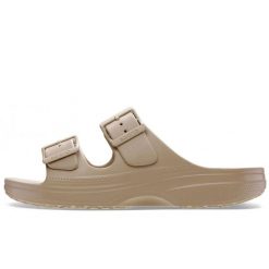 Klapki Crocs Saturday Sandal W Damskie. Brązowe klapki damskie Crocs, na lato, bez wzorów, z materiału, bez obcasa, bez zapięcia. Za 253.99 zł.