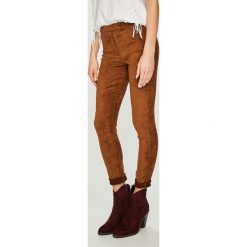Answear - Legginsy Orient Express. Żółte legginsy damskie ANSWEAR, bez wzorów, z materiału. W wyprzedaży za 59.90 zł.