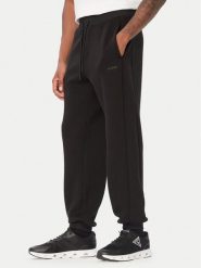 Guess Spodnie dresowe Z6BB03 K6544 Czarny Regular Fit. Czarne spodnie sportowe męskie Guess, m, z aplikacjami, z dresówki. Za 434.99 zł.
