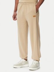 HUGO Spodnie dresowe Nevatro 50564047 Beżowy Regular Fit. Brązowe spodnie sportowe męskie Hugo, m, bez wzorów, z bawełny. Za 499.99 zł.