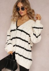 Jasnobeżowy Zapinany Kardigan w Paski i Warkoczykowy Splot Isildesa. Brązowe kardigany damskie Renee, l, z aplikacjami, z dzianiny, bez kołnierzyka. Za 159.99 zł.
