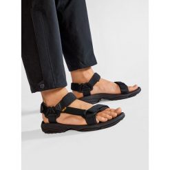 Sandały Teva. Zielone sandały damskie Teva, bez wzorów, bez obcasa, na koturnie, bez zapięcia. Za 329.99 zł.