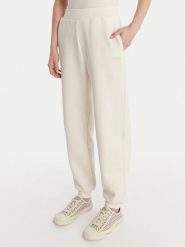 Guess Spodnie dresowe V6RB15 K9V31 Écru Regular Fit. Spodnie dresowe damskie Guess, z aplikacjami, z bawełny. Za 299.99 zł.