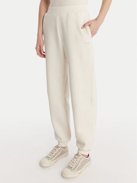 Guess Spodnie dresowe V6RB15 K9V31 Écru Regular Fit. Spodnie dresowe damskie Guess, z aplikacjami, z bawełny. Za 299.99 zł.