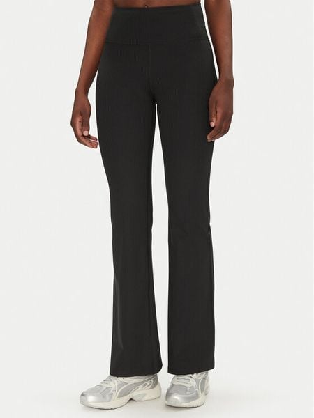 Girlfriend Collective Legginsy Rib Flare 4038RIB Czarny Slim Fit. Czarne legginsy damskie GIRLFRIEND COLLECTIVE, bez wzorów, z syntetyku. Za 229.99 zł.