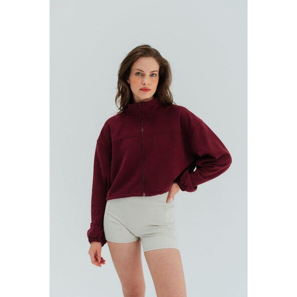 Kurtka sportowa Moonholi Uptown z zamkiem. Czerwone kurtki sportowe damskie MOONHOLI, bez wzorów, bez ramiączek, bez kaptura, na jogę i pilates. Za 399.00 zł.