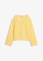 Sweter ażurowy oversize, o kroju pudełkowym. Żółte swetry nierozpinane damskie bonprix, w ażurowe wzory, z bawełny, bez kołnierzyka, bez ramiączek. Za 112.99 zł.