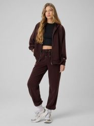 4F Spodnie z szerokimi nogawkami z modalem damskie - brązowe XL. Brązowe spodnie dresowe damskie 4F, bez wzorów, z dresówki. W wyprzedaży za 159.99 zł.