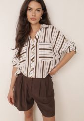 Brązowa Letnia Koszula Oversize z Bawełny w Paski z Nietoperzowymi Rękawami Sheilla. Brązowe koszule damskie Born2be, bez wzorów, z bawełny, eleganckie, bez kołnierzyka, bez ramiączek. Za 99.99 zł.