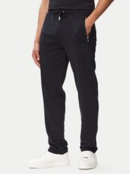 KARL LAGERFELD Spodnie dresowe 705019 563900 Granatowy Regular Fit. Niebieskie spodnie sportowe męskie KARL LAGERFELD, l, bez wzorów, z bawełny. Za 619.99 zł.