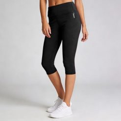 Legginsy Softee Impulse Capri w kolorze czarnym. Czarne legginsy damskie Softee, bez wzorów, z elastanu. Za 135.00 zł.