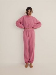 Spodnie od piżamy - intensywny róż. Czerwone piżamy damskie Reserved, bez wzorów, z bawełny, bez ramiączek. W wyprzedaży za 55.99 zł.