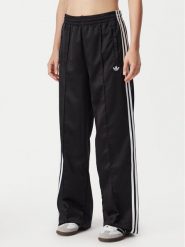 Adidas Spodnie dresowe Satin Sst KS9372 Czarny Loose Fit. Czarne spodnie dresowe damskie Adidas, bez wzorów, z dresówki. Za 349.99 zł.