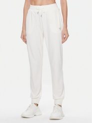 Guess Spodnie dresowe V3BB27 KBXI2 Écru Regular Fit. Spodnie dresowe damskie Guess, z aplikacjami, z dresówki. Za 199.99 zł.