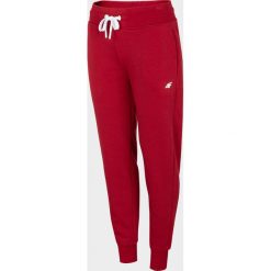 Spodnie dresowe damskie SPDD300 - ciemna czerwień. Czerwone spodnie dresowe damskie 4F, bez wzorów, z dresówki, climacool (adidas). Za 99.99 zł.