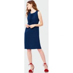 Elegancka sukienka z koronką. Sukienki damskie Greenpoint, bez wzorów, z koronki, eleganckie, bez kołnierzyka, bez ramiączek. Za 59.99 zł.