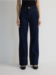 Jeansy wide leg - granatowy. Niebieskie jeansy damskie Reserved, bez wzorów, z bawełny. W wyprzedaży za 99.99 zł.
