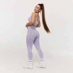Legginsy GymBeam Lift. Fioletowe legginsy damskie GYMBEAM, bez wzorów, z materiału. Za 94.99 zł.