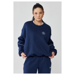 Damska bluza sportowa oversize Rough Radical Trip Classic. Niebieskie bluzy damskie ROUGH RADICAL, bez wzorów, sportowe, bez ramiączek, bez kaptura. Za 167.92 zł.