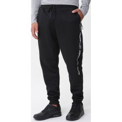 Czarne Spodnie Ravenousness. Czarne spodnie sportowe męskie Born2be, l, bez wzorów, z dzianiny, climacool (adidas). Za 49.99 zł.