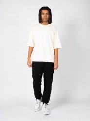 Fila T-Shirt "Castellar" | FAM0303 | Mężczyzna | Beżowy. Brązowe t-shirty męskie Fila, m, bez wzorów, z elastanu, bez kołnierzyka, bez ramiączek. W wyprzedaży za 139.00 zł.
