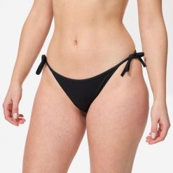 Dół kostiumu kąpielowego surfingowego damski Olaian Sofy. Czarne bikini OLAIAN, xs, bez wzorów, z elastanu. Za 19.99 zł.