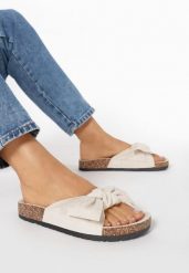 Jasnobeżowe Klapki Danagale. Brązowe klapki damskie Born2be, bez wzorów, bez obcasa, na płaskiej podeszwie, bez zapięcia. Za 59.99 zł.