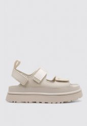 Sandały Ugg Australian W Złotym Świecie Damskie. Białe sandały damskie UGG, bez wzorów, z materiału, bez obcasa, na platformie, bez zapięcia. Za 523.99 zł.