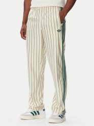 Adidas Spodnie dresowe Firebird Pinstripes KT4300 Kremowy Regular Fit. Białe spodnie sportowe męskie Adidas, l, bez wzorów, z dresówki. Za 349.99 zł.