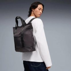 Plecak Puma Essentials Tote Backpack 12L. Czarne plecaki męskie Puma, bez wzorów, z materiału. Za 390.00 zł.