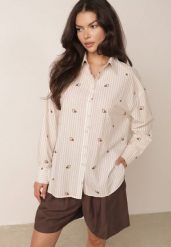 Beżowa Koszula na Lato z Bawełny o Kroju Oversize w Paski i Haftowany Wzór Deinaris. Brązowe koszule damskie Born2be, bez wzorów, z bawełny, eleganckie, bez kołnierzyka, bez ramiączek. Za 119.99 zł.
