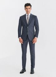 Granatowy garnitur męski. Niebieskie garnitury męskie Pako Lorente, m, bez wzorów, z elastanu, biznesowe. Za 1,099.98 zł.