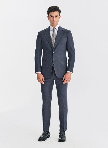 Granatowy garnitur męski. Niebieskie garnitury męskie Pako Lorente, m, bez wzorów, z elastanu, biznesowe. Za 1,099.98 zł.