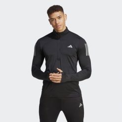 Bluza Own the Run 1/4 Zip Long Sleeve. Czarne bluzy męskie Adidas, s, bez wzorów, z materiału, sportowe, bez ramiączek, bez kaptura. W wyprzedaży za 207.60 zł.