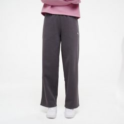 Spodnie dresowe damskie Puma Gym & Pilates. Czarne spodnie dresowe damskie Puma, bez wzorów, z bawełny, sportowe, na fitness i siłownię. Za 129.99 zł.